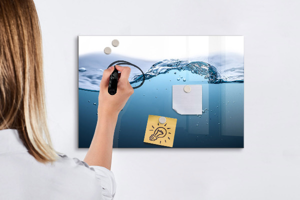 Magnetic dry erase board Water background with photos and accessories