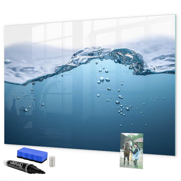 Magnetic dry erase board Water background with photos and accessories