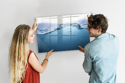 Magnetic dry erase board Water background with photos and accessories