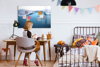 Magnetic dry erase board Water background with photos and accessories