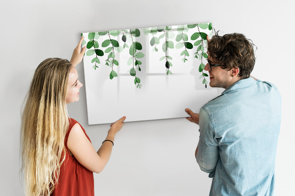 Dry erase board magnetic Green leaves and photos on the wall