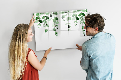 Dry erase board magnetic Green leaves and photos on the wall