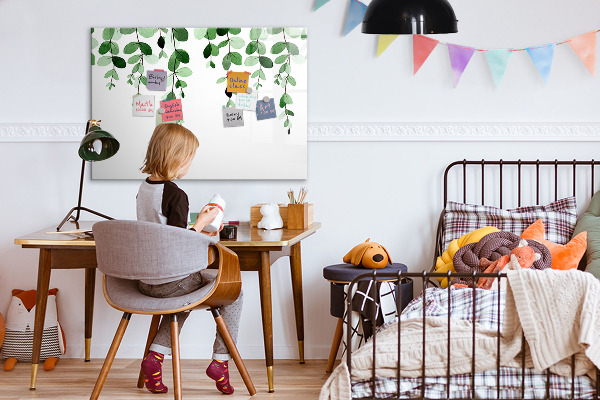 Dry erase board magnetic Green leaves and photos on the wall