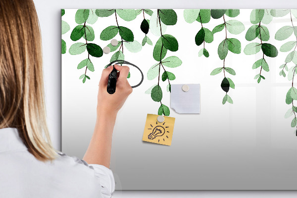 Dry erase board magnetic Green leaves and photos on the wall