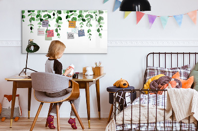 Dry erase board magnetic Green leaves and photos on the wall