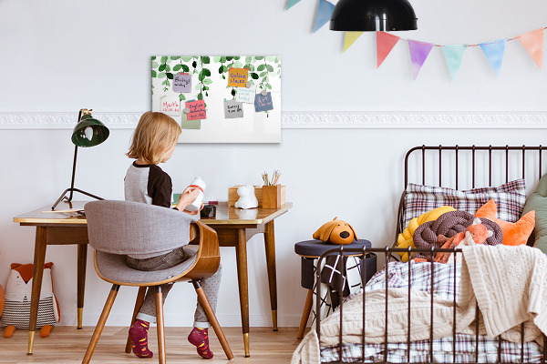 Dry erase board magnetic Green leaves and photos on the wall