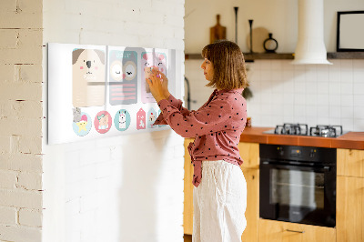 Magnetic dry erase board Colorful notes and photos on the wall