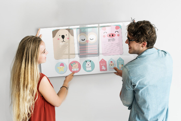 Magnetic dry erase board Colorful notes and photos on the wall