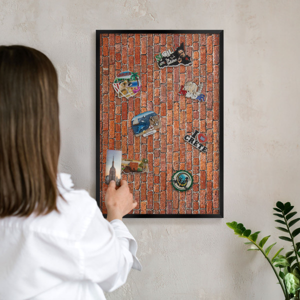 Metal wall board for magnets in a black frame Brick motif