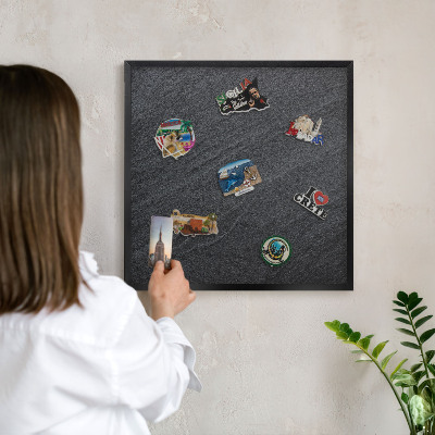 Vacation magnet board with a black frame Gray texture