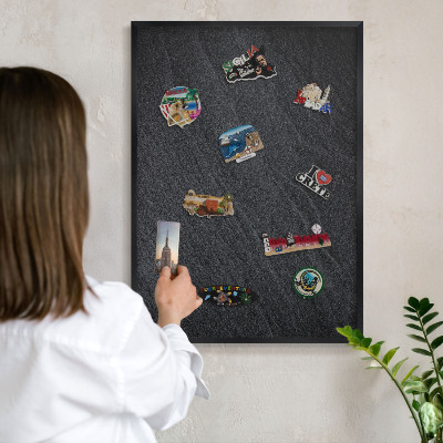 Vacation magnet board with a black frame Gray texture