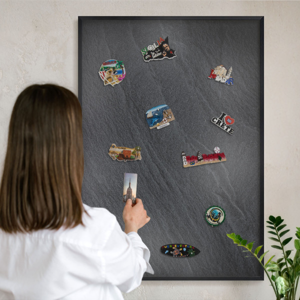 Vacation magnet board with a black frame Gray texture