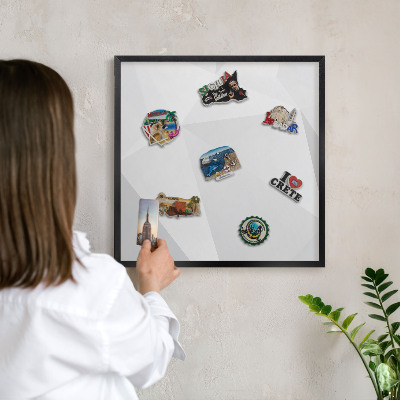 Vacation magnet board with a black frame White geometry
