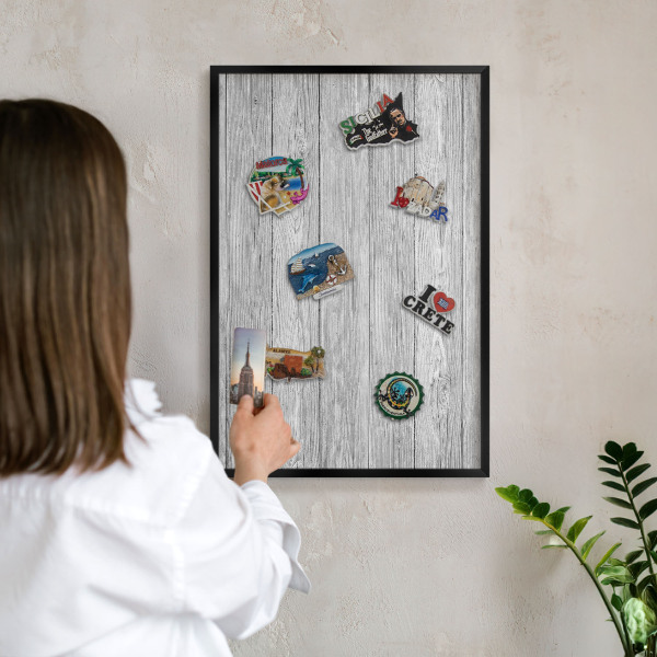 Vacation magnet board with a black frame Wooden texture