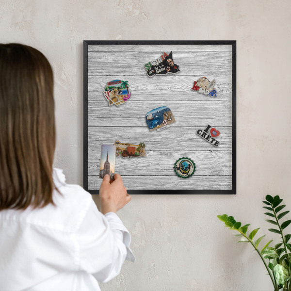 Vacation magnet board with a black frame Wooden texture