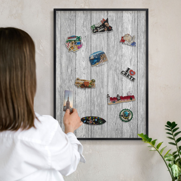 Vacation magnet board with a black frame Wooden texture