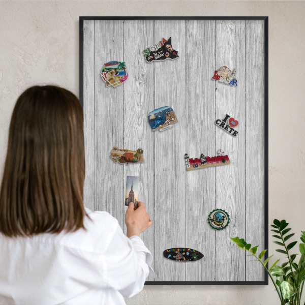 Vacation magnet board with a black frame Wooden texture