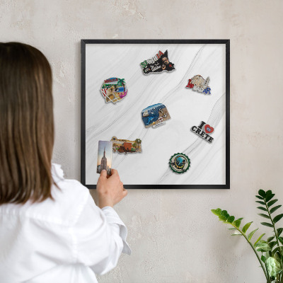 Metal wall board for magnets in a black frame Subtle marble