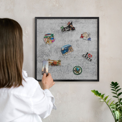 Metal wall board for magnets in a black frame Gray surface