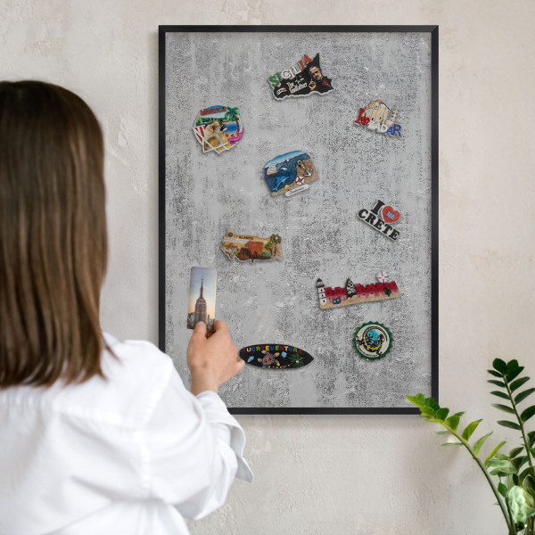 Metal wall board for magnets in a black frame Gray surface