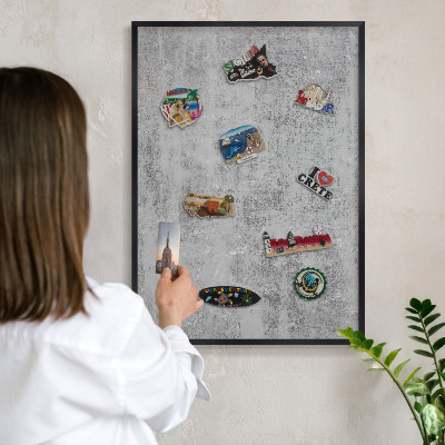 Metal wall board for magnets in a black frame Gray surface