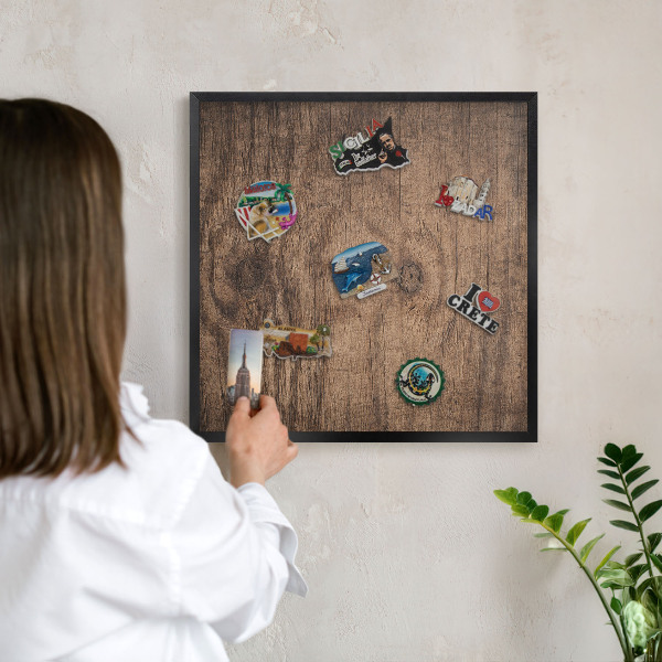 Vacation magnet board with a black frame Wooden texture
