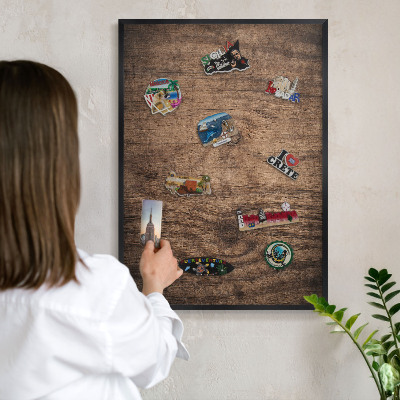 Vacation magnet board with a black frame Wooden texture