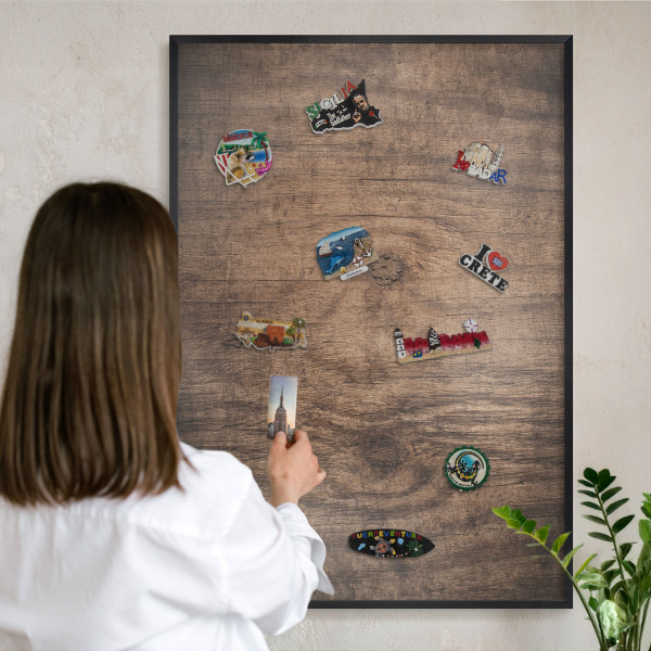 Vacation magnet board with a black frame Wooden texture