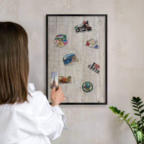 Vacation magnet board with a black frame Wooden texture