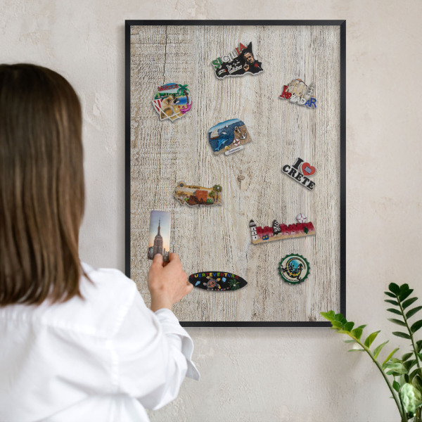 Vacation magnet board with a black frame Wooden texture