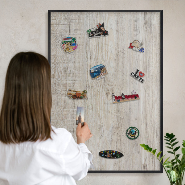 Vacation magnet board with a black frame Wooden texture
