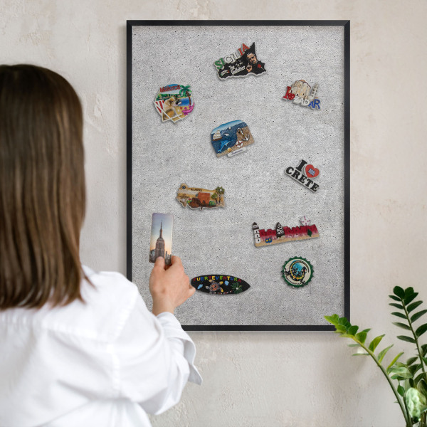 Vacation magnet board with a black frame Gray texture