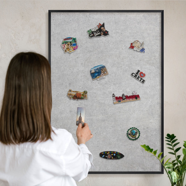 Vacation magnet board with a black frame Gray texture
