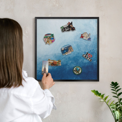Metal wall board for magnets in a black frame Blue abstractions