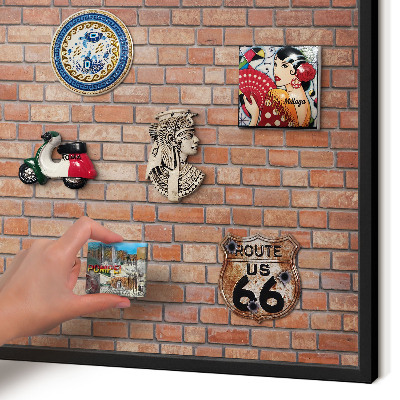 Metal wall board for magnets in a black frame Brick wall