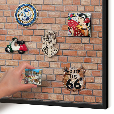 Metal wall board for magnets in a black frame Brick wall