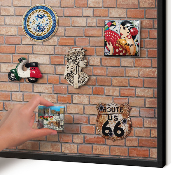 Metal wall board for magnets in a black frame Brick wall