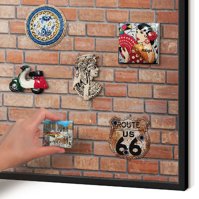 Metal wall board for magnets in a black frame Brick wall