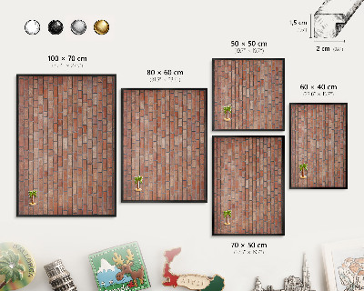 Metal wall board for magnets in a black frame Brick wall