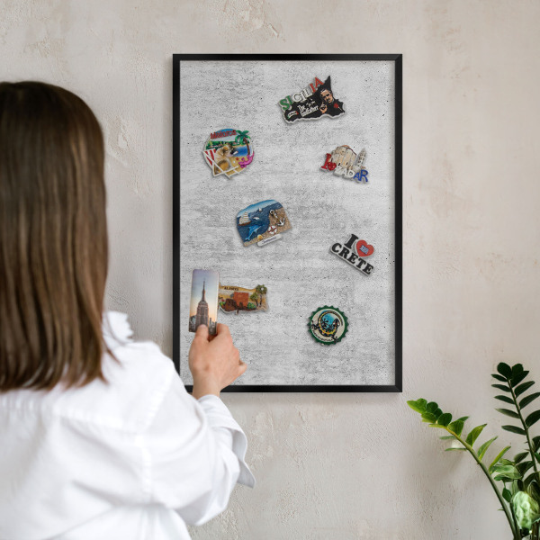 Metal wall board for magnets in a black frame Gray texture
