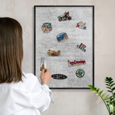 Metal wall board for magnets in a black frame Gray texture