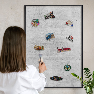 Metal wall board for magnets in a black frame Gray texture