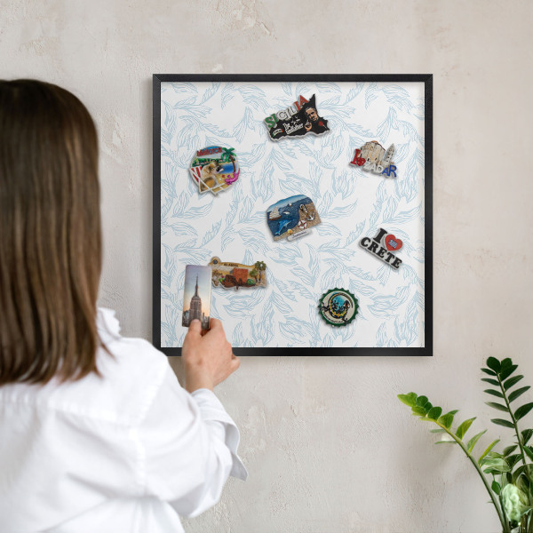Vacation magnet board with a black frame Light theme