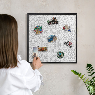 Metal wall board for magnets in a black frame Geometric symmetry