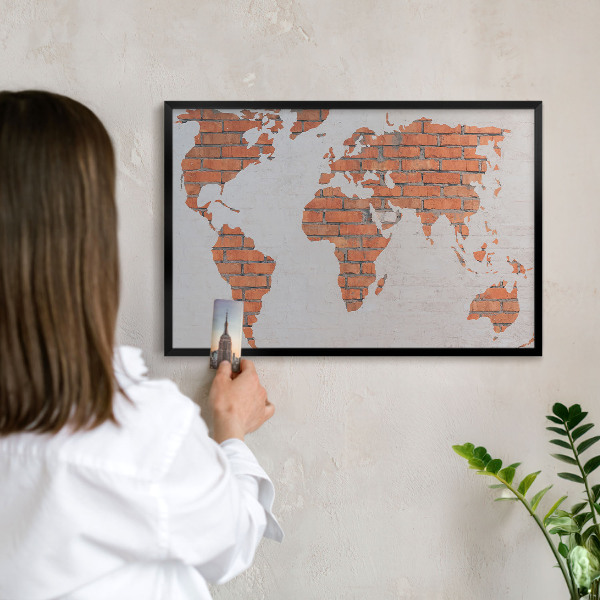 Metal wall board for magnets in a black frame Brick map