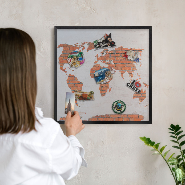Metal wall board for magnets in a black frame Brick map