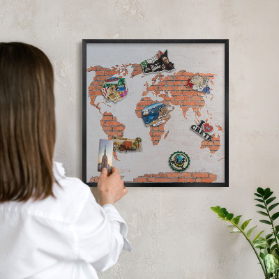 Metal wall board for magnets in a black frame Brick map