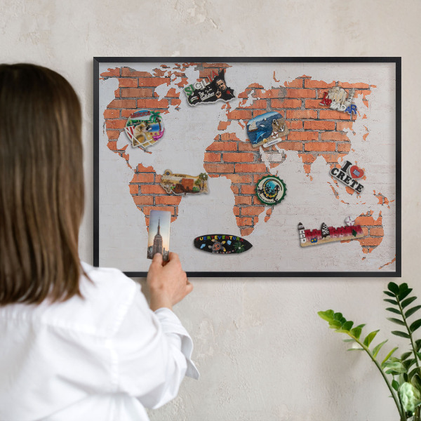 Metal wall board for magnets in a black frame Brick map