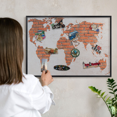 Metal wall board for magnets in a black frame Brick map