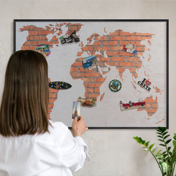 Metal wall board for magnets in a black frame Brick map